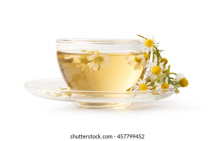 Cup of medicinal chamomile tea isolated on white background