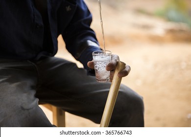 Cup Of Mezcal Beverage In Hand, From Oaxaca Mexico 