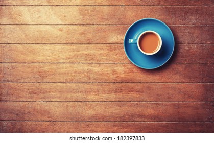 Cup of ?offee on a wooden table. - Powered by Shutterstock