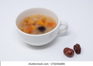 A Cup Of Papaya Pudding With Snow Fungus