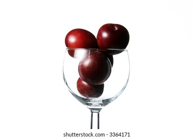 cup with plums