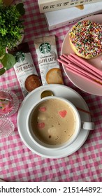 A Cup Of Starbucks Coffee To Start Your Day In A Pink House