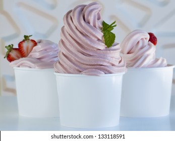 Cup Of Strawberry Frozen Yogurt Or Soft Serve Ice Cream With Fresh Fruit.