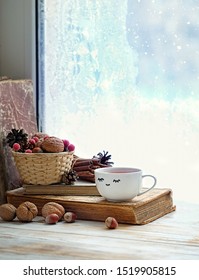 Cup Of Tea, Books, Nuts, Sweater And Frosty Window. Sweater Weather, Cozy Home, Winter Season Background. Christmas And New Year Holiday 