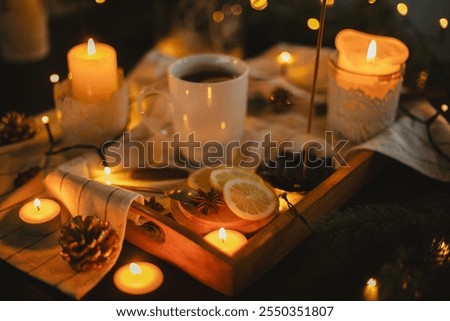 Similar – Image, Stock Photo a burning candle in a dark pub