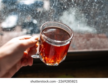 Cup of tea by the window