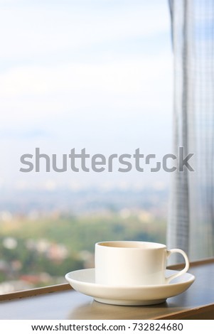A cup of tea with curtain pattern background, mock up tea bag