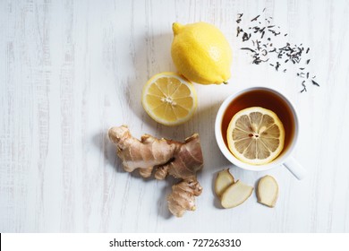 cup of tea with fresh lemon and ginger, top view - Powered by Shutterstock