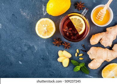 cup of tea with ginger, lemon, honey, anise, cloves, cardamom and mint