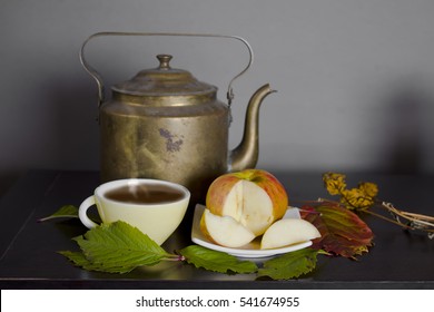 A Cup Of Tea, Grape Leaves And Sliced Apple, Studio Still Life