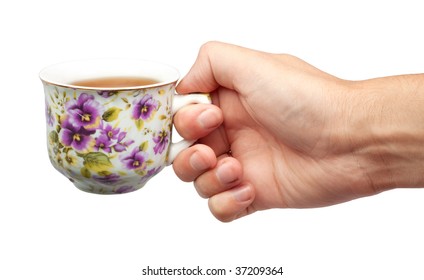 A cup of tea and a hand