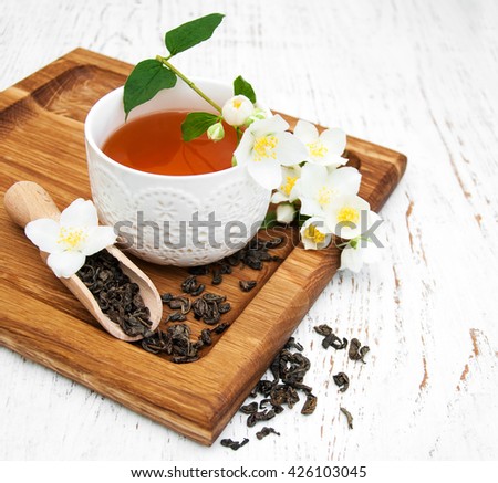 Similar – Cup with acacia blossoms Tea with spoon and honey