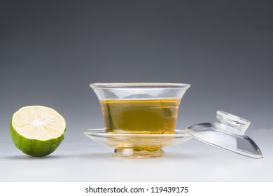 a cup of tea with lime