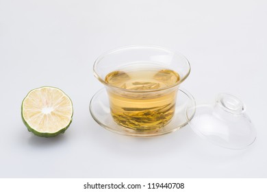 a cup of tea with lime