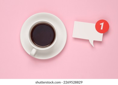 Cup of tea and Notification speech bubble with 1 number on pink background. Social media chat, message, sms, subscribe notice alert and reminder. Top view - Powered by Shutterstock