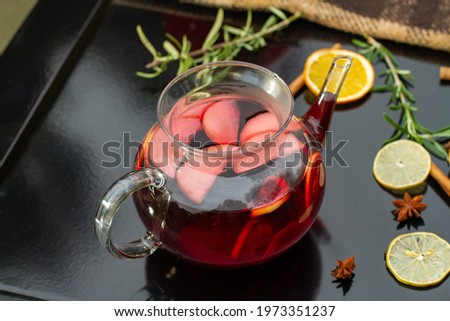 cup of tea on grean background teapot summer
