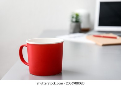 Cup of tea on office table