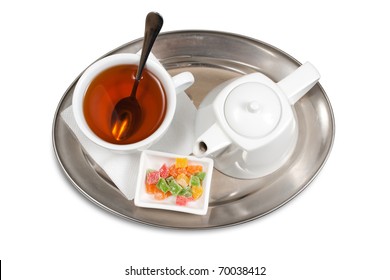 cup of tea on a saucer isolated on a white background
