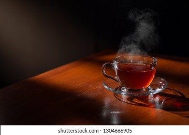 a cup of tea is on the table