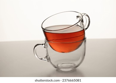 cup of tea on yellow background  - Shutterstock ID 2376665081