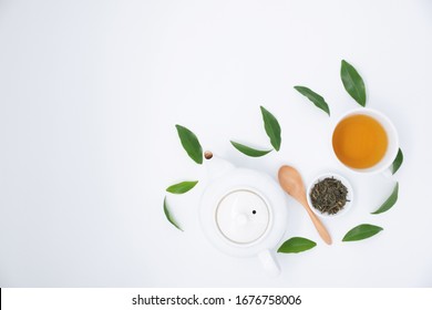 cup with tea and teapot on white  background. over light - Powered by Shutterstock