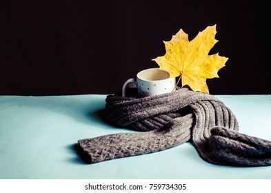 Cup Of Tea Wrapped In A Scarf