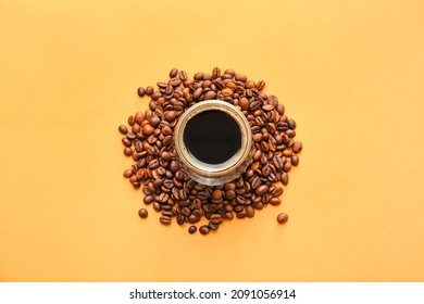 Cup Of Turkish Coffee And Beans On Color Background