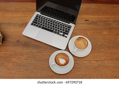  cup or two coffee notebook 
