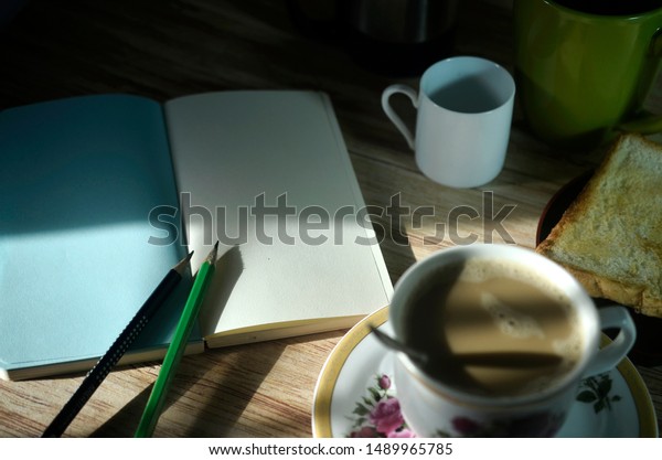 Cup Water On Table Books Personal Stock Photo Edit Now