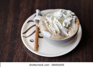 Cup Of Whipped Cream Vienna Coffee With Cinnamon Stick