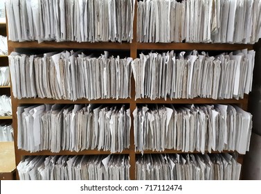 A Cupboard Full Of Paper Files / Inefficiency Of Paper Based Filing System