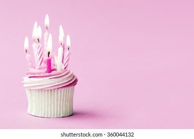 Cupcake Decorated With Pink Birthday Candles