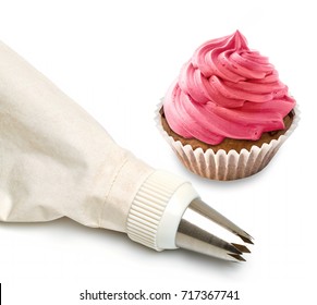 Cupcake decorating tools, icing bag and nibs or tips isolated on white background
 - Powered by Shutterstock