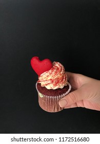 cupcake in hand