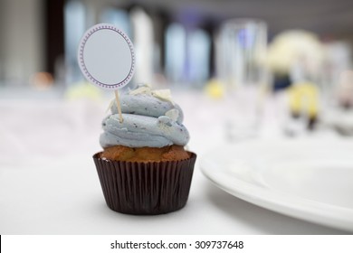 Cupcake With Place Card On Wedding Table 