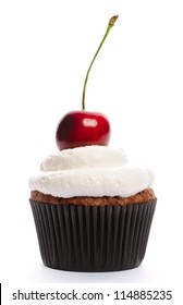 Cupcake With Whipped Cream And Cherry Isolated On White