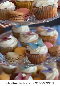 Cupcakes And Macaroons On A Tiered Stand