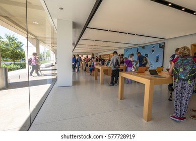 Cupertino, CA, United States - August 15, 2016: People Inside The Popular Apple Store Of Apple Inc Headquarters At One Infinite Loop Located In Cupertino, Silicon Valley, California.