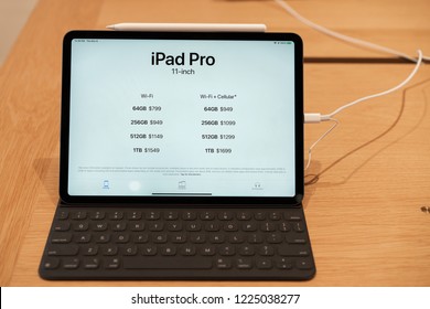 Cupertino, California / USA - November,8, 2018 Apple Store New Product. Ipad Pro with 12.9 inch Liquid retina display with smart keyboard folio. Modern tablet with capacity and prices on screen