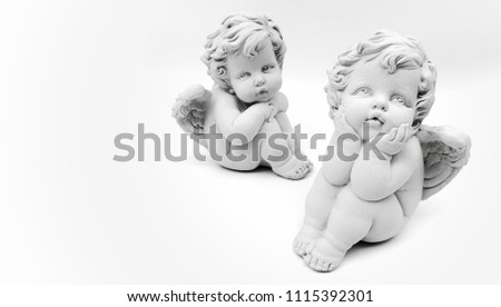 Cupid Statue decorated on white background.