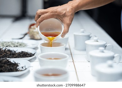 Cupping or testing the quality of the tea