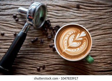 cups of cappuccino with latte art on  wooden background,top view,flat lay