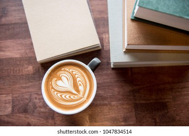 cups of cappuccino with latte art on  wooden background,top view,flat lay