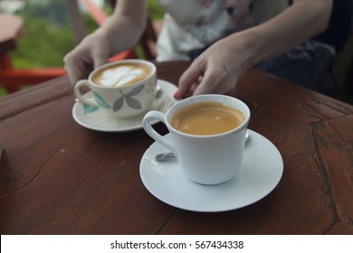 cups of coffee on a table 