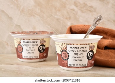 Cups Of Trader Joe’s Coconut Cream Greek Non Fat Yogurt With A Spoon  Illustrative Editorial