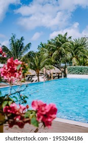 Curacao Willemstad, Couple Mid Age Asian Woman And European Man On Vacation At A Luxury Resort In Pietermaai 