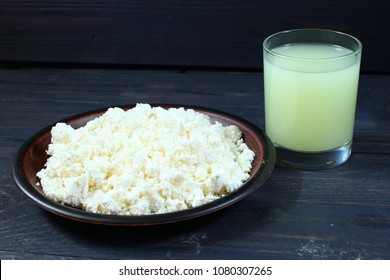 Curds And Whey In A Glass On Wooden Background