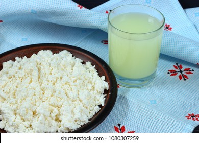 Curds And Whey On A Dark Wooden Background