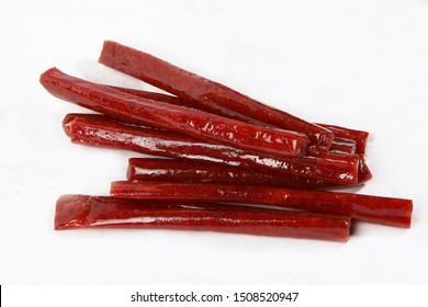 Cured Meat On A White Background. Pieces Of Jerky. View From Above. Isolated Object.