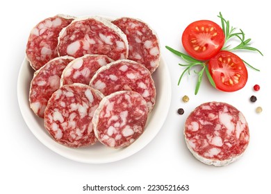 Cured salami sausage in ceramic bowl isolated on white background. Italian cuisine with full depth of field. Top view. Flat lay.